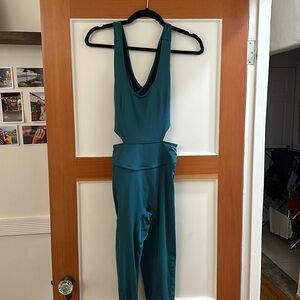 NWT free people movement “back it up” Onsie